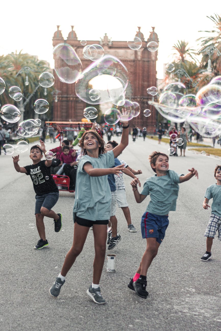 children playing bubbles